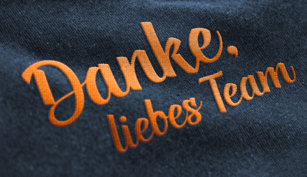 Mainstick-Arbeitsbekleidung-Teambekleidung-Anzeige-Teamspirit